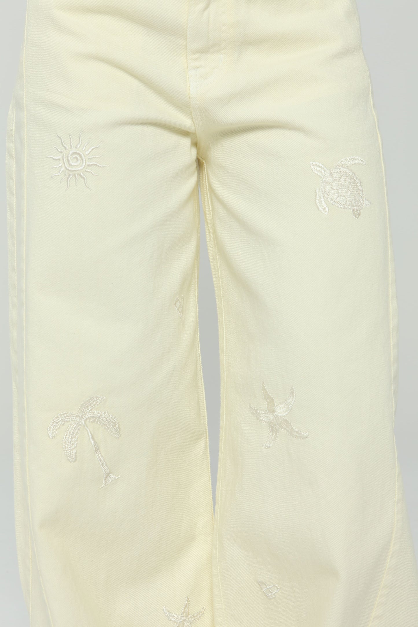 Pantalón palazzo con bordado en delantero