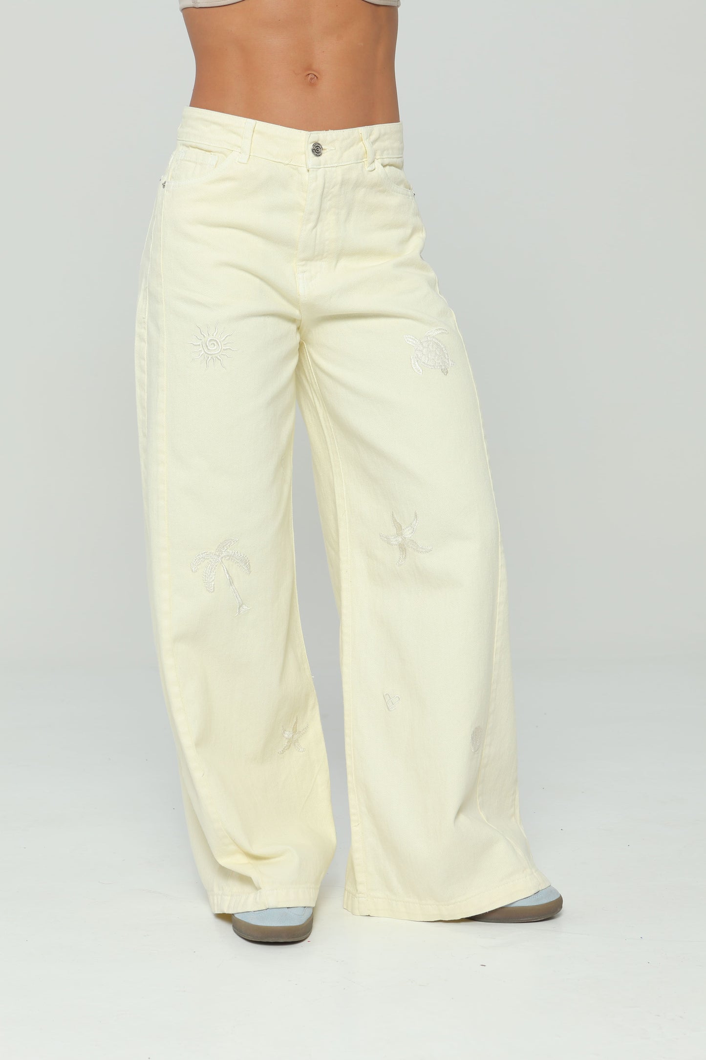 Pantalón palazzo con bordado en delantero