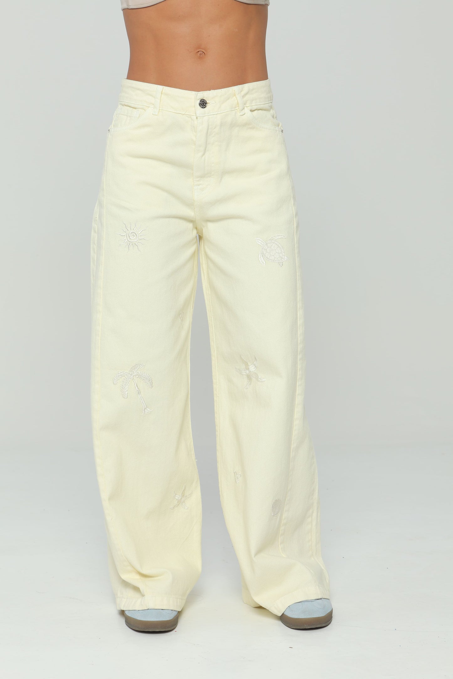 Pantalón palazzo con bordado en delantero
