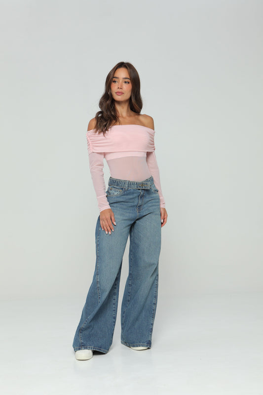 Jeans palazzo con corte en costados