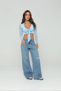 Jeans wide leg con charreteras en cintura
