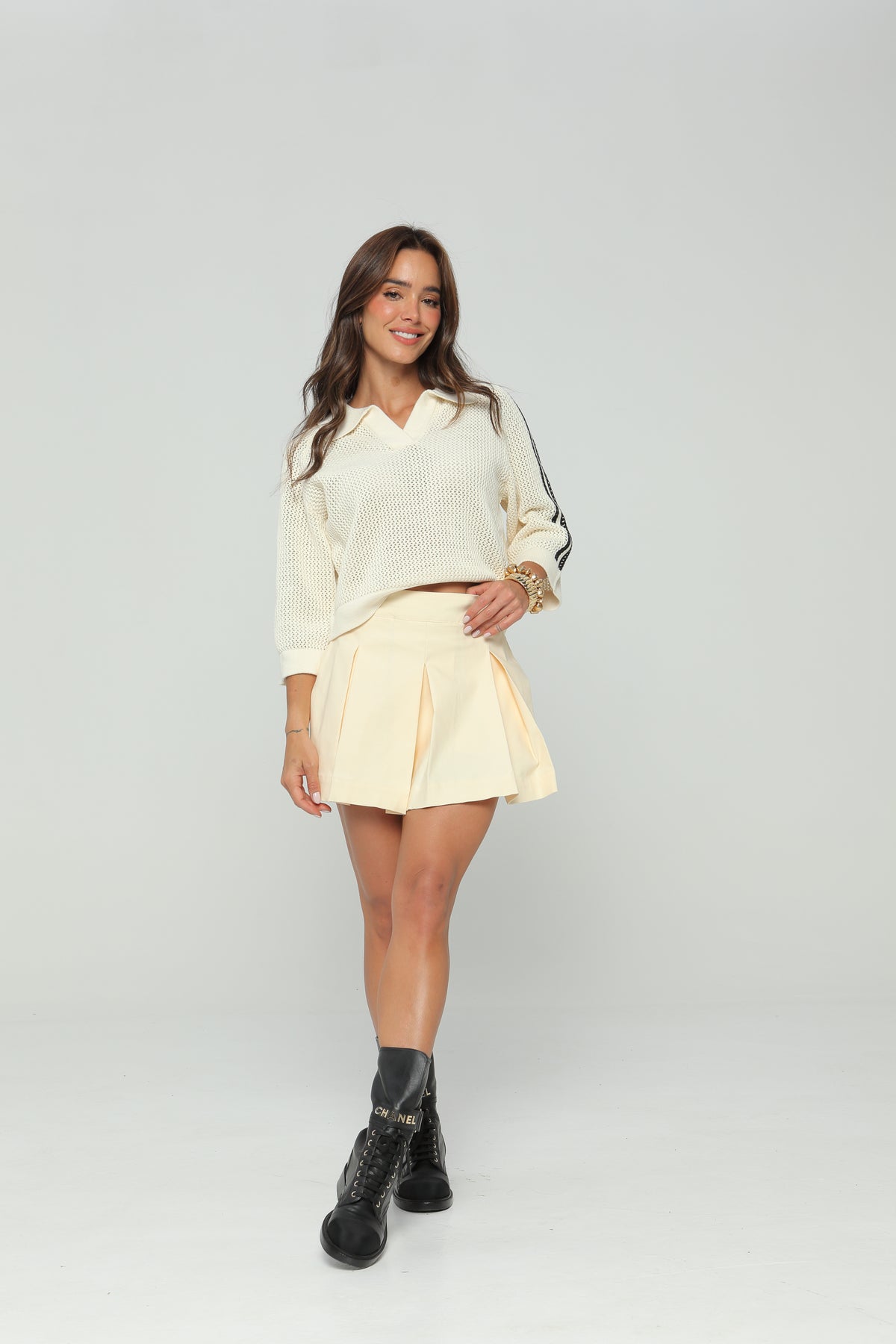 Blusa tejida manga 3/4 con rayas negras