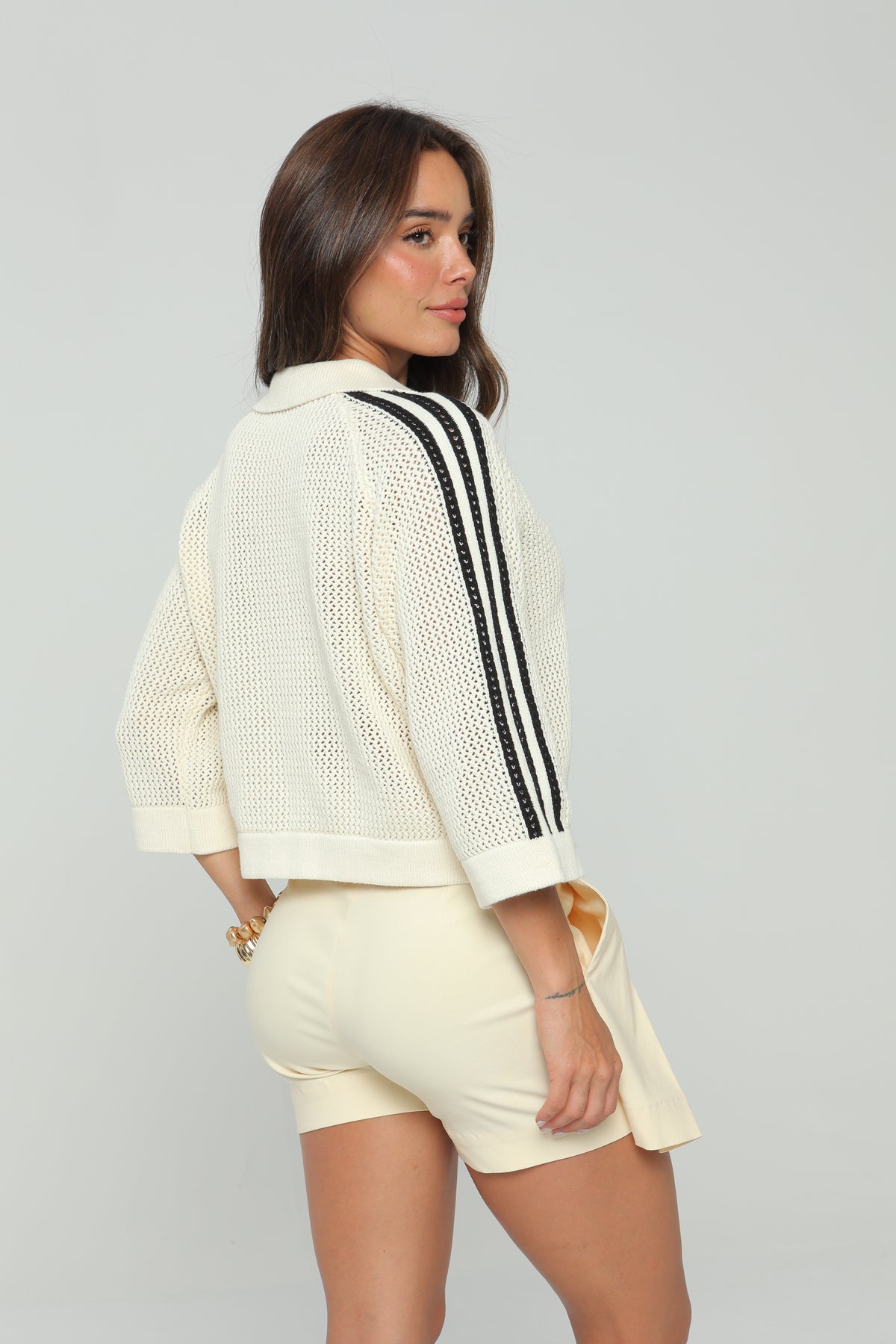 Blusa tejida manga 3/4 con rayas negras